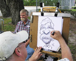 dave smith drawing a caricature of a man with a huge mustache!
