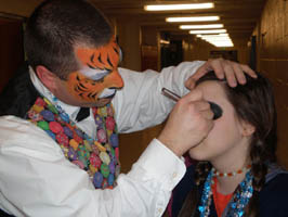 an oddzin ends face painter who looks like a tiger