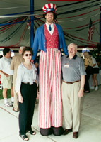 Chuck Flayhart stilt walking as Uncle Sam